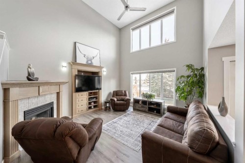 9 Hidden Valley Crescent Nw, Calgary, AB - Indoor Photo Showing Living Room With Fireplace