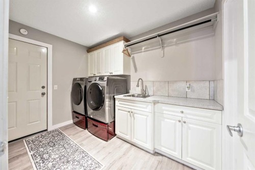 9 Hidden Valley Crescent Nw, Calgary, AB - Indoor Photo Showing Laundry Room