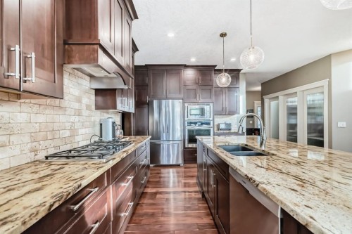 4 Auburn Sound Court Se, Calgary, AB - Indoor Photo Showing Kitchen With Stainless Steel Kitchen With Double Sink With Upgraded Kitchen