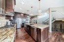 4 Auburn Sound Court Se, Calgary, AB  - Indoor Photo Showing Kitchen With Stainless Steel Kitchen With Upgraded Kitchen 
