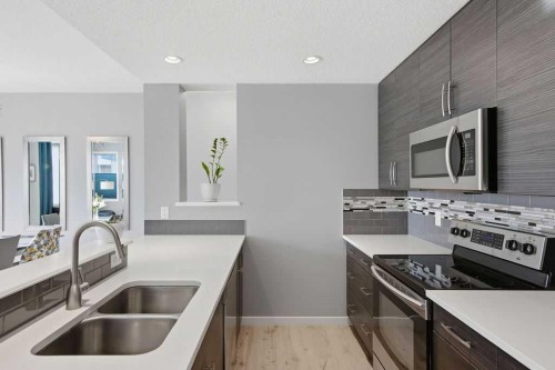 105 Chaparral Valley Crescent Se, Calgary, AB - Indoor Photo Showing Kitchen With Double Sink
