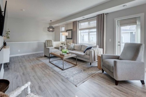 405 Cranbrook Walk Se, Calgary, AB - Indoor Photo Showing Living Room