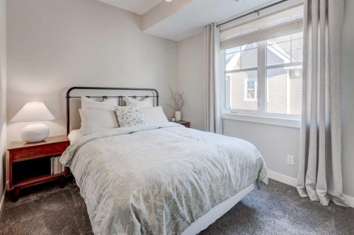 405 Cranbrook Walk Se, Calgary, AB - Indoor Photo Showing Bedroom