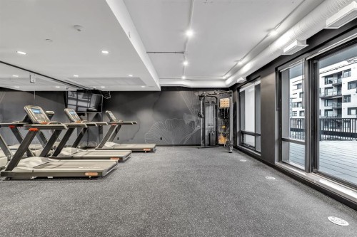 513-8375 Broadcast Avenue Sw, Calgary, AB - Indoor Photo Showing Gym Room