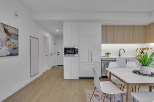 513-8375 Broadcast Avenue Sw, Calgary, AB - Indoor Photo Showing Dining Room