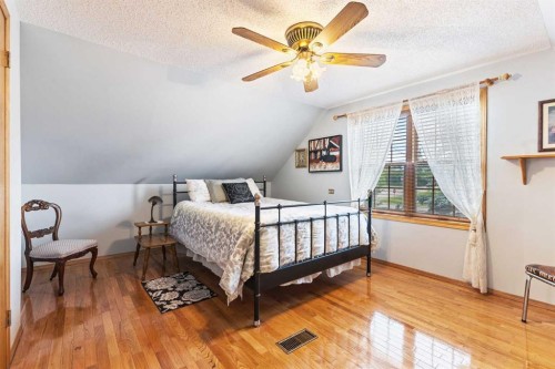 717 East Road, Standard, AB - Indoor Photo Showing Bedroom