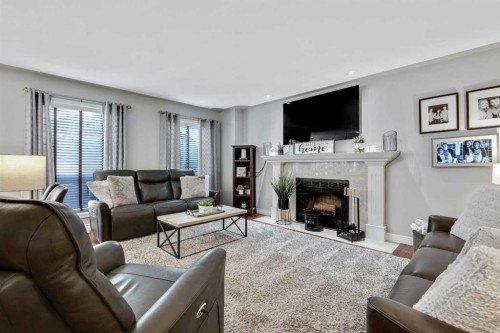 7 Mountain Park Circle Se, Calgary, AB - Indoor Photo Showing Living Room With Fireplace