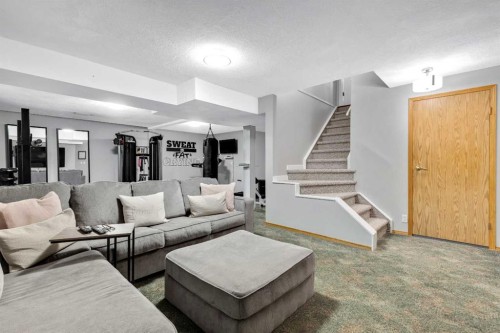 7 Mountain Park Circle Se, Calgary, AB - Indoor Photo Showing Living Room