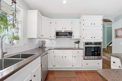 188 Millrise Drive Sw, Calgary, AB - Indoor Photo Showing Kitchen With Double Sink
