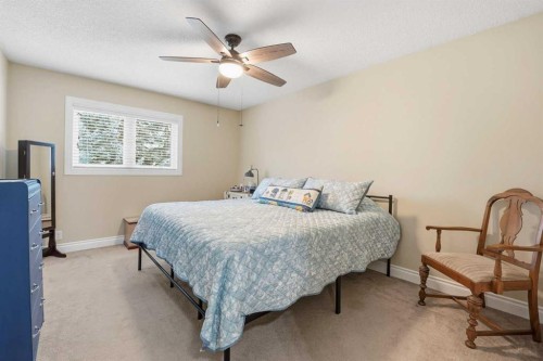 188 Millrise Drive Sw, Calgary, AB - Indoor Photo Showing Bedroom