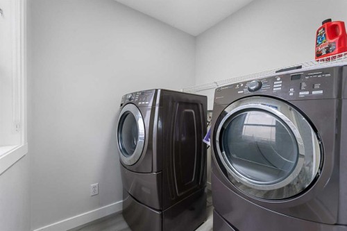 280 Windermere Drive, Chestermere, AB - Indoor Photo Showing Laundry Room
