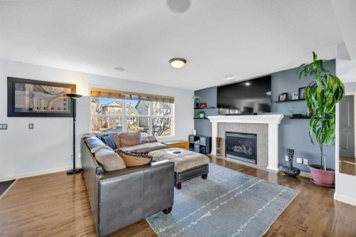 139 Prestwick Point Se, Calgary, AB - Indoor Photo Showing Living Room With Fireplace