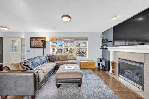 139 Prestwick Point Se, Calgary, AB - Indoor Photo Showing Living Room With Fireplace