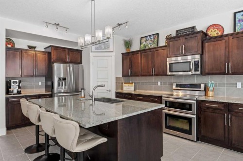 184 Magenta Crescent, Chestermere, AB - Indoor Photo Showing Kitchen With Upgraded Kitchen