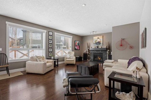 184 Magenta Crescent, Chestermere, AB - Indoor Photo Showing Living Room With Fireplace