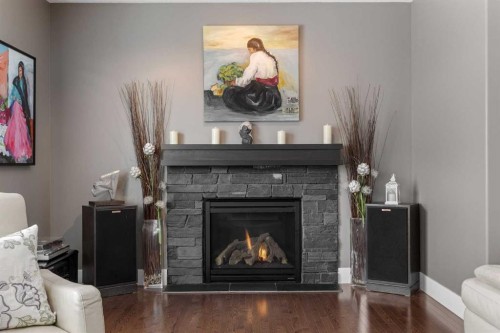 184 Magenta Crescent, Chestermere, AB - Indoor Photo Showing Living Room With Fireplace