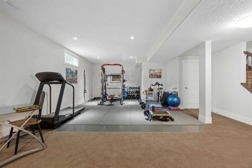 184 Magenta Crescent, Chestermere, AB - Indoor Photo Showing Gym Room