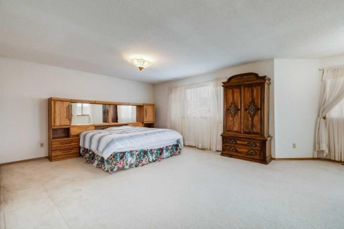 106 Sienna Hills Drive Sw, Calgary, AB - Indoor Photo Showing Bedroom