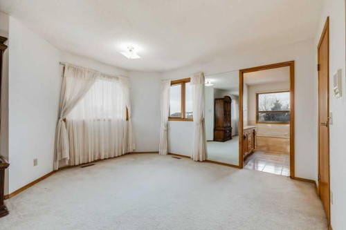 106 Sienna Hills Drive Sw, Calgary, AB - Indoor Photo Showing Other Room