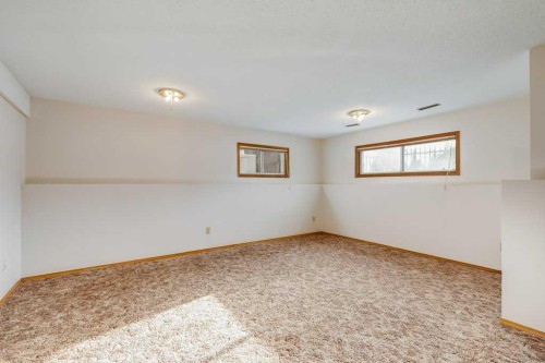 106 Sienna Hills Drive Sw, Calgary, AB - Indoor Photo Showing Other Room