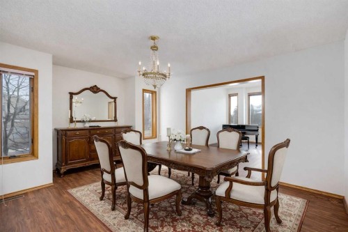 106 Sienna Hills Drive Sw, Calgary, AB - Indoor Photo Showing Dining Room