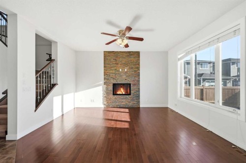 59 Redstone Park Ne, Calgary, AB - Indoor Photo Showing Living Room With Fireplace