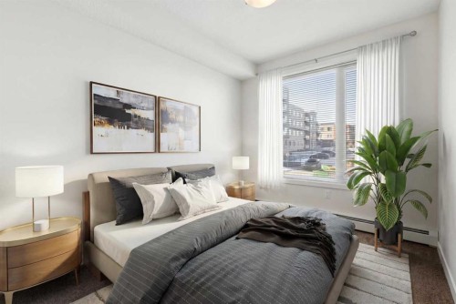 208-30 Shawnee Common Sw, Calgary, AB - Indoor Photo Showing Bedroom