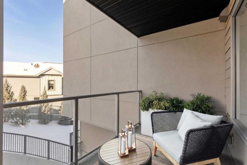 208-30 Shawnee Common Sw, Calgary, AB - Outdoor With Exterior