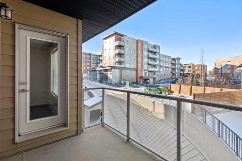 208-30 Shawnee Common Sw, Calgary, AB - Outdoor With Exterior