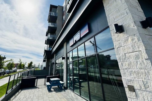 208-30 Shawnee Common Sw, Calgary, AB - Outdoor With Exterior