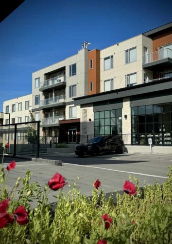 208-30 Shawnee Common Sw, Calgary, AB - Outdoor With Facade