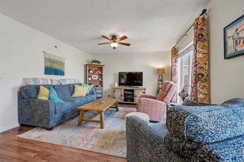 48 Harvest Park Road Ne, Calgary, AB - Indoor Photo Showing Living Room