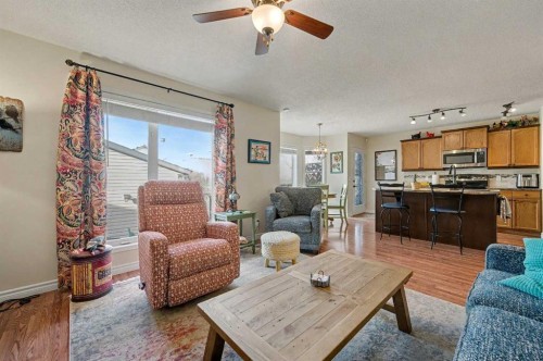 48 Harvest Park Road Ne, Calgary, AB - Indoor Photo Showing Living Room