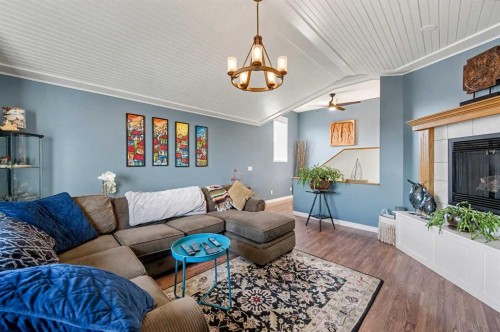 48 Harvest Park Road Ne, Calgary, AB - Indoor Photo Showing Living Room With Fireplace
