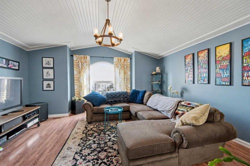 48 Harvest Park Road Ne, Calgary, AB - Indoor Photo Showing Living Room