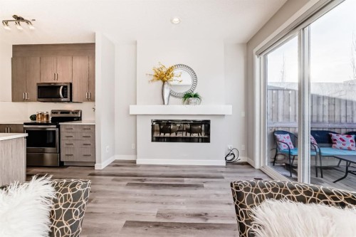267 Sage Bluff Rise Nw, Calgary, AB - Indoor With Fireplace