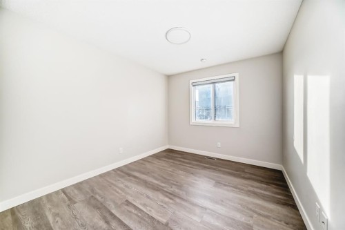 267 Sage Bluff Rise Nw, Calgary, AB - Indoor Photo Showing Other Room