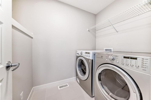 267 Sage Bluff Rise Nw, Calgary, AB - Indoor Photo Showing Laundry Room