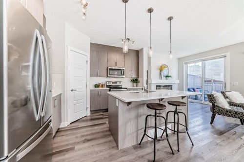 267 Sage Bluff Rise Nw, Calgary, AB - Indoor Photo Showing Kitchen With Double Sink With Upgraded Kitchen