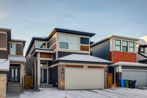 153 Edith Villas Nw, Calgary, AB - Outdoor With Facade