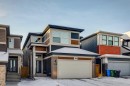 153 Edith Villas Nw, Calgary, AB  - Outdoor With Facade 