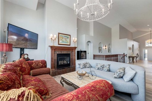 79 Discovery Ridge Park Sw, Calgary, AB - Indoor Photo Showing Living Room With Fireplace