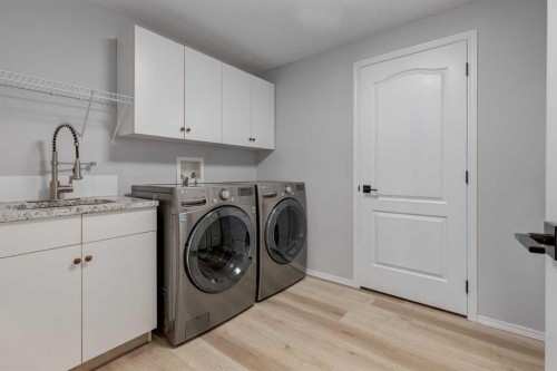 79 Discovery Ridge Park Sw, Calgary, AB - Indoor Photo Showing Laundry Room