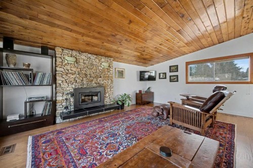 7331 Silver Mead Road Nw, Calgary, AB - Indoor Photo Showing Living Room With Fireplace