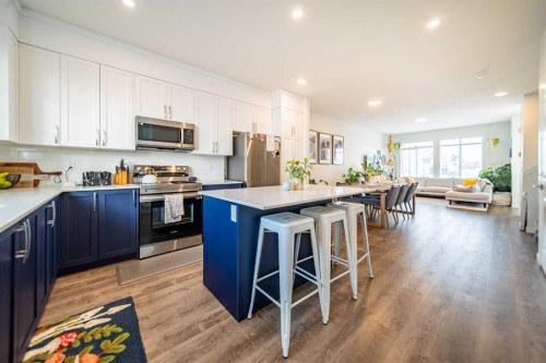 27 Iris Crescent, Okotoks, AB - Indoor Photo Showing Kitchen With Stainless Steel Kitchen With Upgraded Kitchen