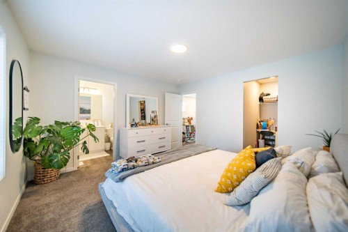 27 Iris Crescent, Okotoks, AB - Indoor Photo Showing Bedroom