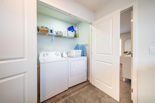 27 Iris Crescent, Okotoks, AB - Indoor Photo Showing Laundry Room