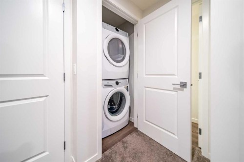 27 Iris Crescent, Okotoks, AB - Indoor Photo Showing Laundry Room
