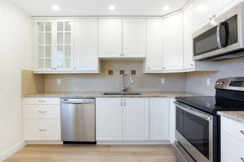 14668 Deer Run Drive Se, Calgary, AB - Indoor Photo Showing Kitchen With Upgraded Kitchen