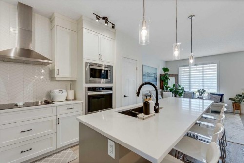 145 Lucas Crescent Nw, Calgary, AB - Indoor Photo Showing Kitchen With Double Sink With Upgraded Kitchen